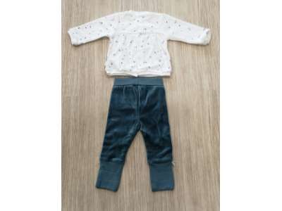 La espalda del conjunto viene con abertura completa con cierre de corchetes