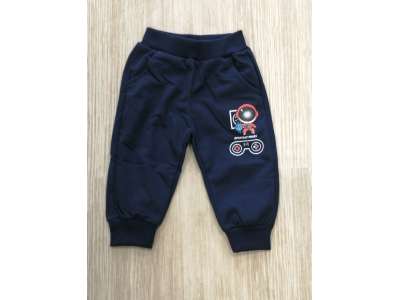 Pantalón de chándal azul marino con dibujo de astronauta naranja